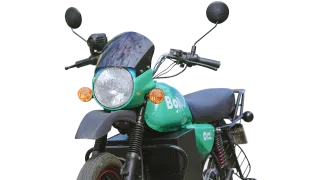 Smiling rider on an e-motorbike
